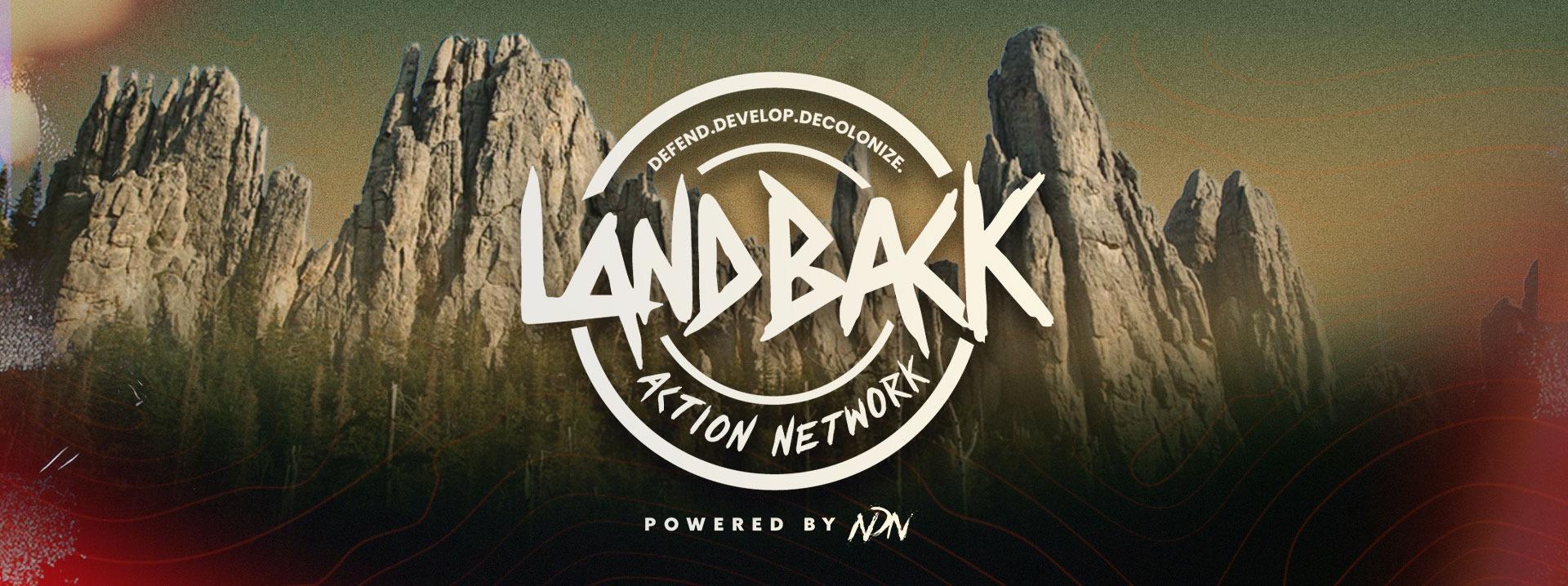 "LANDBACK Action Network" Text in front of a photo of rock pillars commonly called "the needles" in the Black Hills. Powered by NDN Collective.